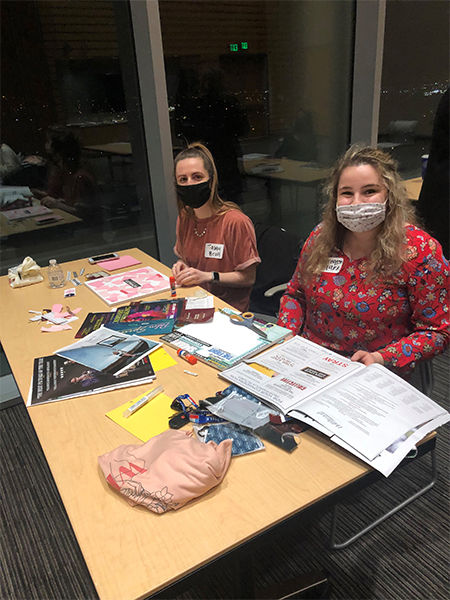 Female students at a vision board event